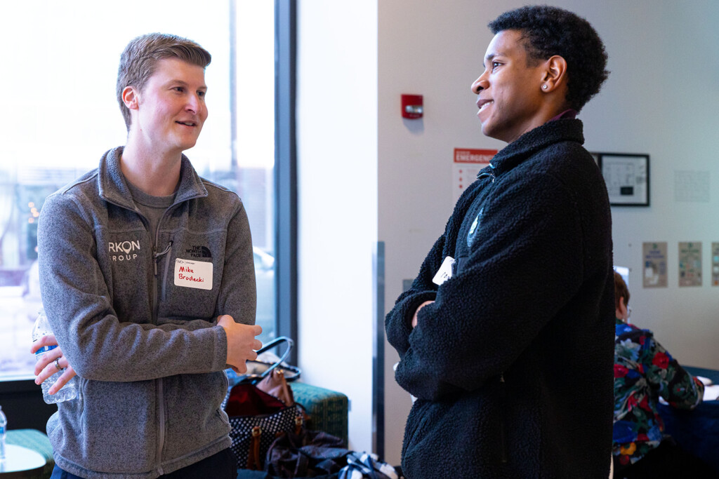 Photo of two students speaking to each other at 2025 Marketing Boot Camp