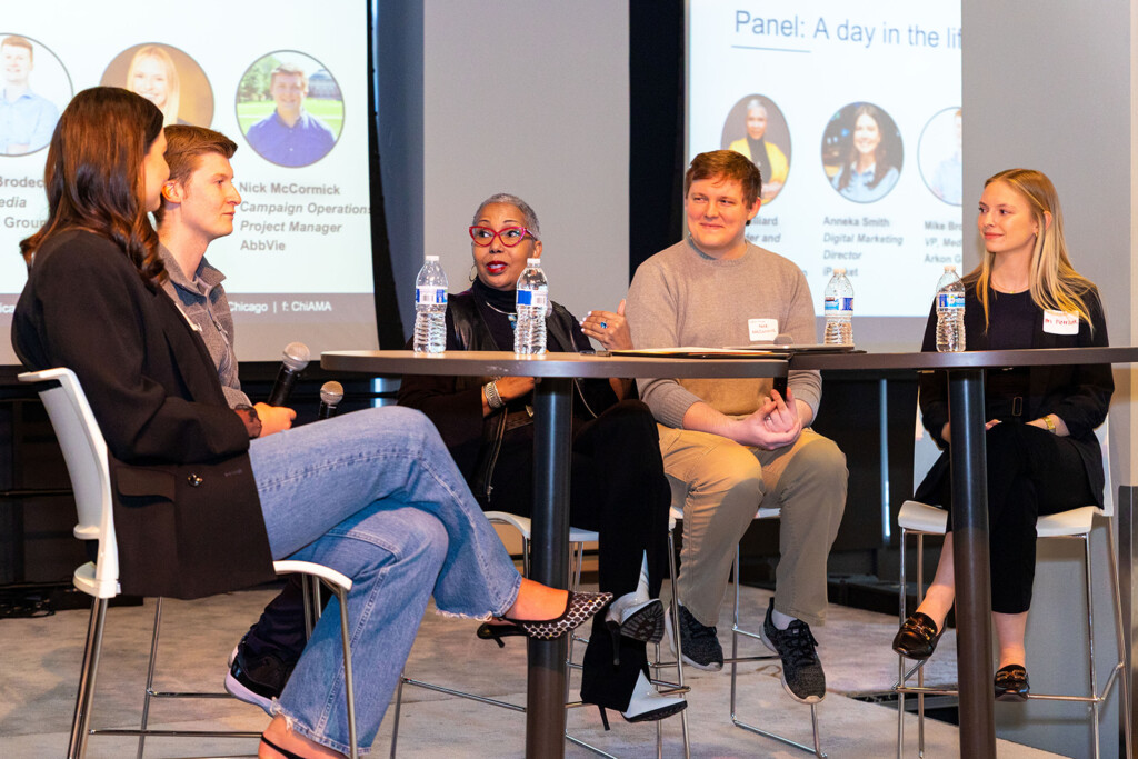 Photo of a panel of recent graduates working in marketing, discussing a day in the life of a marketer at 2025 Marketing Boot Camp